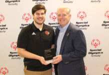 UofL graduate student and Louisville native Corey Chitwood (left) was recently named volunteer of the year by Special Olympics Kentucky.
