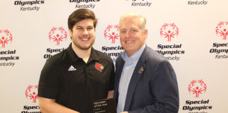 UofL graduate student and Louisville native Corey Chitwood (left) was recently named volunteer of the year by Special Olympics Kentucky.