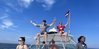 John Pierce Wise Sr. center, with members of his research team during an expedition to collect whale cells. Left to right: Idoia Meaza, grad student, Johnny Wise, assistant professor, Rick Walker, volunteer driver, Jennifer Toyoda, grad student, and Aggie Williams, grad student