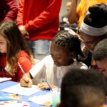 MLK Day of Service, 2019. UofL students worked with children from the Louisville Urban League.