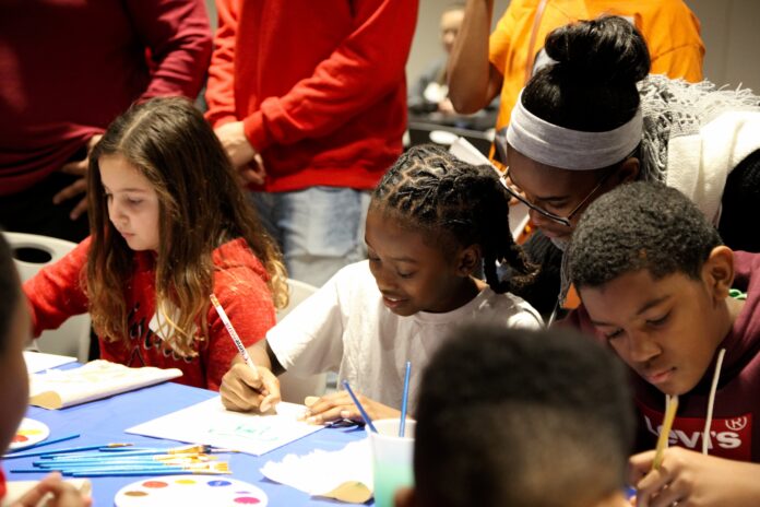 MLK Day of Service, 2019. UofL students worked with children from the Louisville Urban League.