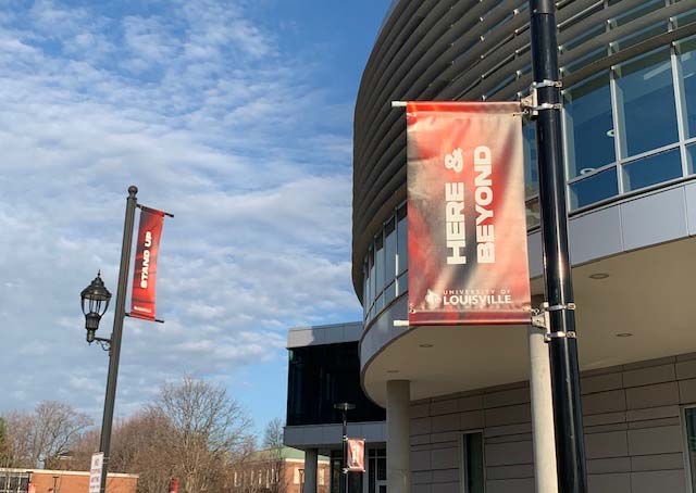 Here and beyond banners on Belknap campus