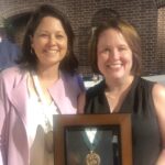 Jennifer Koch, right, receiving the American College of Physicians Laureate Award in Sept. 2019