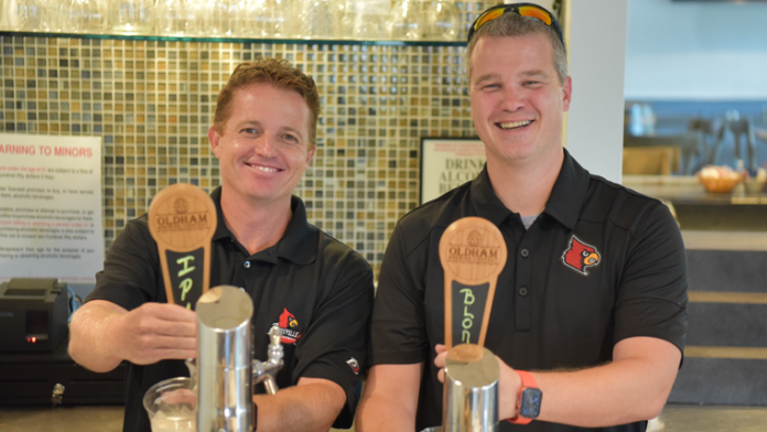 Oldham Brewing Company, a microbrewery with UofL connections, will open this week in Prospect, Kentucky. The business was born from the collective passion of MBA student Steve Cayton, alum Brad Conrad, and brewer John Fee.