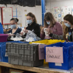 Members from the UofL community organize supplies for Ukraine in partnership with Supplies Overseas (SOS).