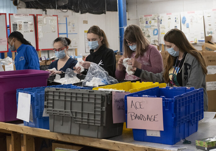 Members from the UofL community organize supplies for Ukraine in partnership with Supplies Overseas (SOS).