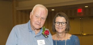 2019 Gold Standard of Optimal Aging Award recipient James Duggins, left, with Anna Faul, executive director of the UofL Trager Institute