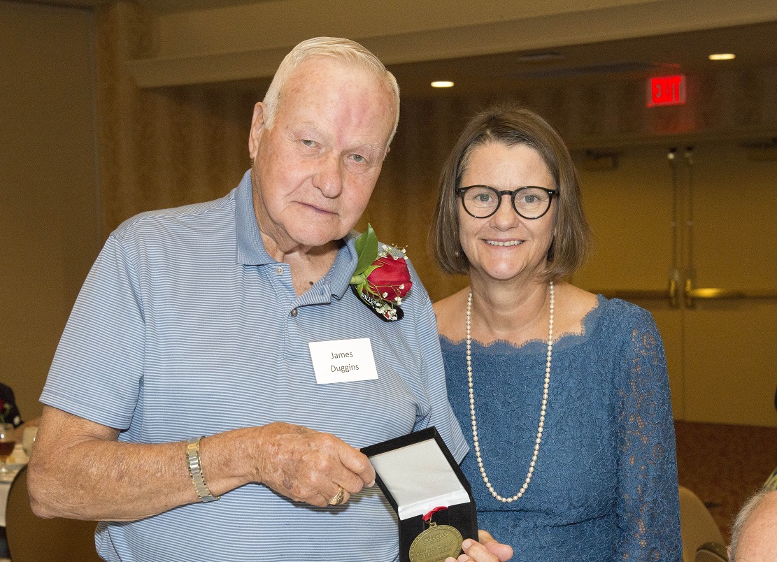2019 Gold Standard of Optimal Aging Award recipient James Duggins, left, with Anna Faul, executive director of the UofL Trager Institute