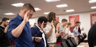 Nearly 100 students, faculty, staff and alums take the oath of the Order of the Engineer at Speed School’s inaugural ring ceremony held April 25, 2022.