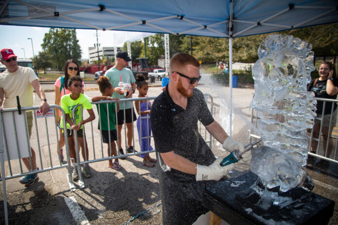 A maker demonstrates ice sculpture at Maker Faire 2019