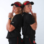 Greenwood sisters pose in their UofL softball uniforms