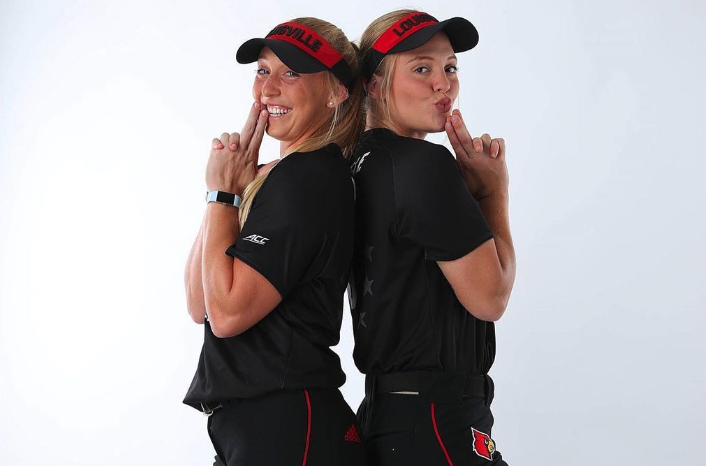 Greenwood sisters pose in their UofL softball uniforms