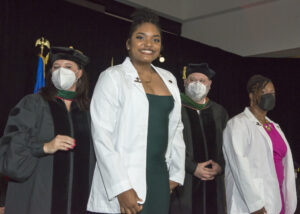 Members of the School of Medicine Class of 2026 receive their white coats