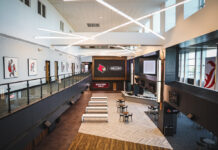 The Angels Envy Bourbon Club includes LED walls, bourbon oak barrels, a custom bourbon barrel storage system and two private speakeasys.