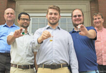 SoFab Inks LLC, a startup consisting of University of Louisville graduate students and mentored by UofL faculty members, is a finalist in the U.S. Department of Energy’s American-Made Perovskite Startup Prize. From left, Craig Grapperhaus, professor of chemistry, graduate students Sashil Chapagain, Blake Martin and Peter Armstrong and Thad Druffel, research theme leader. Photo by Andrew Marsh.