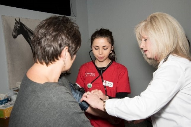 The Association of Public and Land-grant Universities has recognized the University of Louisville for its exemplary community engagement work at the health care clinic for racetrack workers at Churchill Downs.