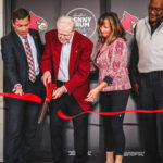 Denny Crum Hall officially opened with a ceremony featuring the legendary coach cutting the ribbon.