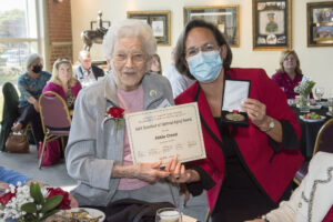 Abbie Creed, 91, left, a 2022 Gold Standard of Optimal Aging honoree, with Christian Furman, medical director of the Trager Institute/Republic Bank Foundation Optimal Aging Clinic