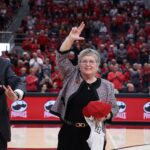 Kim Schatzel and husband Trevor Iles are introduced at KFC Yum! Center during a Louisville Cardinals women's basketball game.