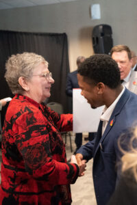 Schatzel greets SGA President Dorian Brown during the Nov. 30 presidential announcement.