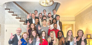 SGA leadership and executive staff with UofL's interim provost and interim president.