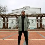 UofL SGA President Dorian Brown stands in Freedom Park.