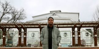 UofL SGA President Dorian Brown stands in Freedom Park.