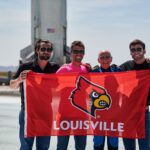 Speed School alumni and Blue Origin employees Nick Greco, Gregg Blincoe and Matt Cosgrove welcome Speed School supporter Clinton Kelly back to Earth after his flight aboard New Shepard.