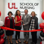 UofL and ScionHealth officials at the ribbon cutting for the School of Nursing Student Collaboration Center.