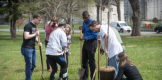 Students planting trees on Arbor Day