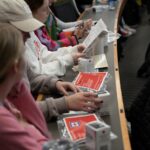 First-year medical students examine Narcan kits provided to them during a session in harm reduction