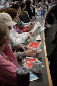 First-year medical students examine Narcan kits provided to them during a session in harm reduction