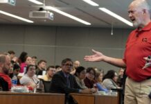 Clinical Professor Pat Murphy instructs first-year medical students at UofL in harm reduction and Narcan use. Photo by Kellen Murphy.