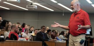 Clinical Professor Pat Murphy instructs first-year medical students at UofL in harm reduction and Narcan use. Photo by Kellen Murphy.