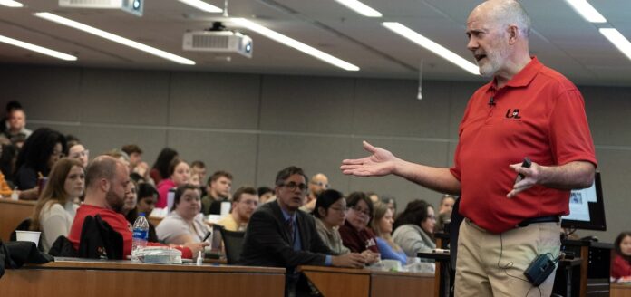 Clinical Professor Pat Murphy instructs first-year medical students at UofL in harm reduction and Narcan use. Photo by Kellen Murphy.