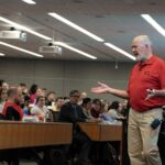 Clinical Professor Pat Murphy instructs first-year medical students at UofL in harm reduction and Narcan use.