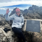 Laura Dixon at the summit of Mount Meru in Tanzania in February 2022. Dixon will tackle Mount Kilimanjaro in March.