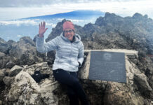 Laura Dixon at the summit of Mount Meru in Tanzania in February 2022. Dixon will tackle Mount Kilimanjaro in March.