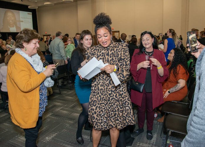 Match Day 2023 UofL medical student opens letter revealing her residency match.