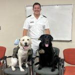 John Bowling with military therapy dogs while on rotation at Walter Reed Medical Center in Bethesda, Maryland. (Photo courtesy John Bowling)