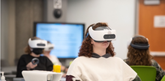 Student uses virtual reality technology for immersive learning.