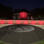 On May 9, Grawemeyer fountains and SAC clock tower on the Belknap Campus were shining red in honor of legendary basketball coach Denny Crum.