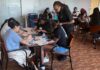 High school students working with mentor