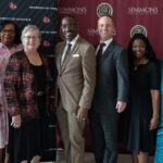 Researchers embarking on a project to understand the Universal Basic Neighborhood, UofL's Ted Smith and Lauren Anderson, Simmons College of Kentucky's Nancy Seay, UofL President Kim Schatzel, Simmons College President Kevin Cosby and Joel Goza, Shavonnie Carthens of University of Kentucky and Patricia Reeves of Simmons and Michael O. Emerson of Rice University