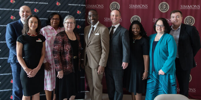 Researchers embarking on a project to understand the Universal Basic Neighborhood, UofL's Ted Smith and Lauren Anderson, Simmons College of Kentucky's Nancy Seay, UofL President Kim Schatzel, Simmons College President Kevin Cosby and Joel Goza, Shavonnie Carthens of University of Kentucky and Patricia Reeves of Simmons and Michael O. Emerson of Rice University