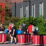 UofL President Kim Schatzel greeted students moving into their residence halls for the 2023-2024 school year.