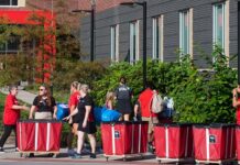 UofL President Kim Schatzel greeted students moving into their residence halls for the 2023-2024 school year.