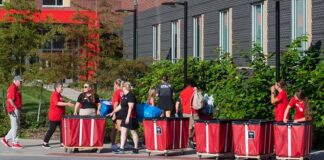 UofL President Kim Schatzel greeted students moving into their residence halls for the 2023-2024 school year.