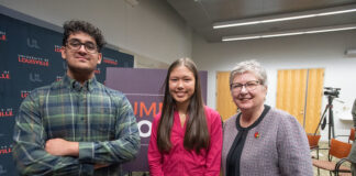 Louisville Science Pathways youth participants Zaheeb Tariq and Liz Bryant with UofL President Kim Schatzel