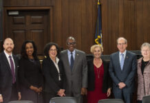 7 people in UofL Brandeis Law's Breit Courtroom
